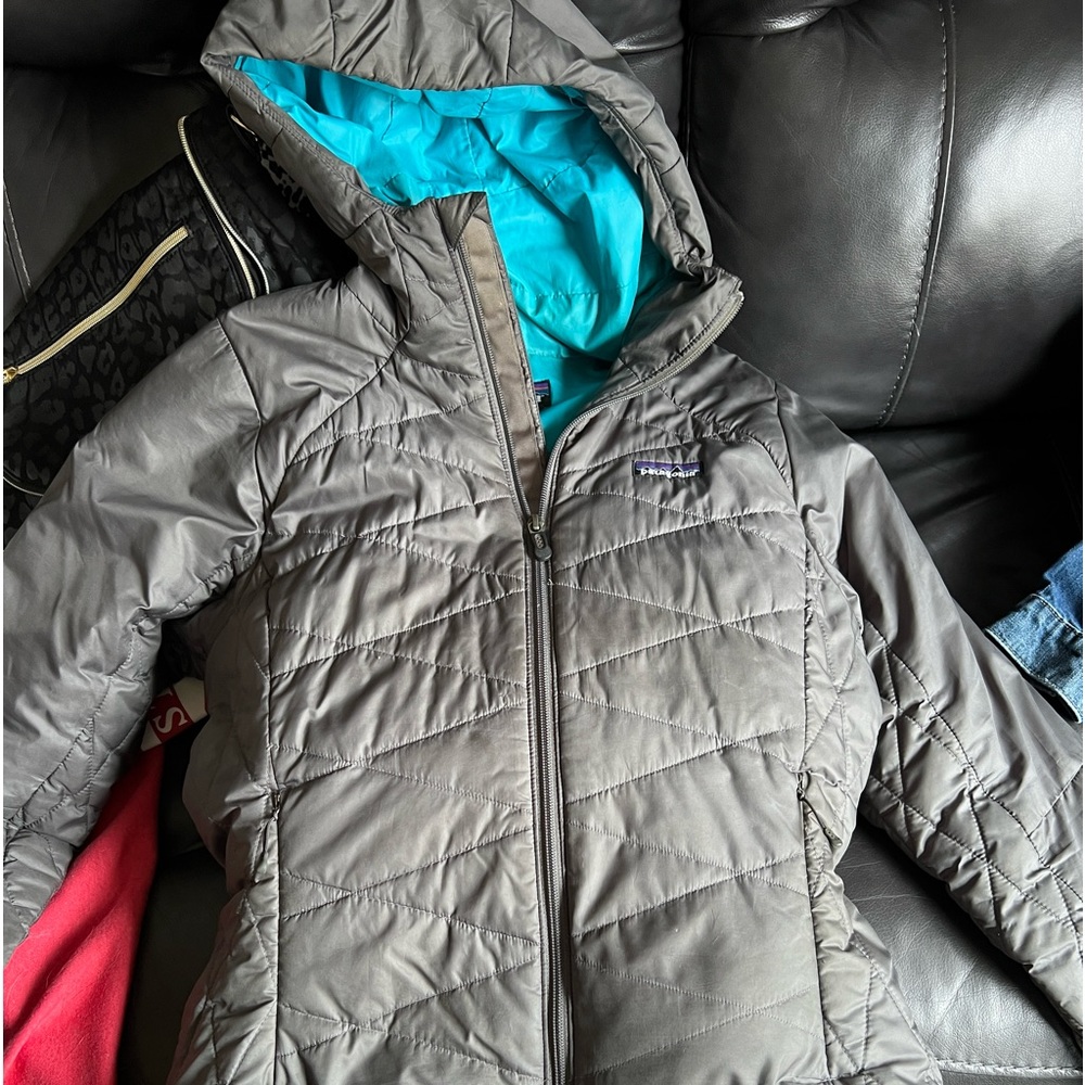 Patagonia jacket not super puff but has some puff.